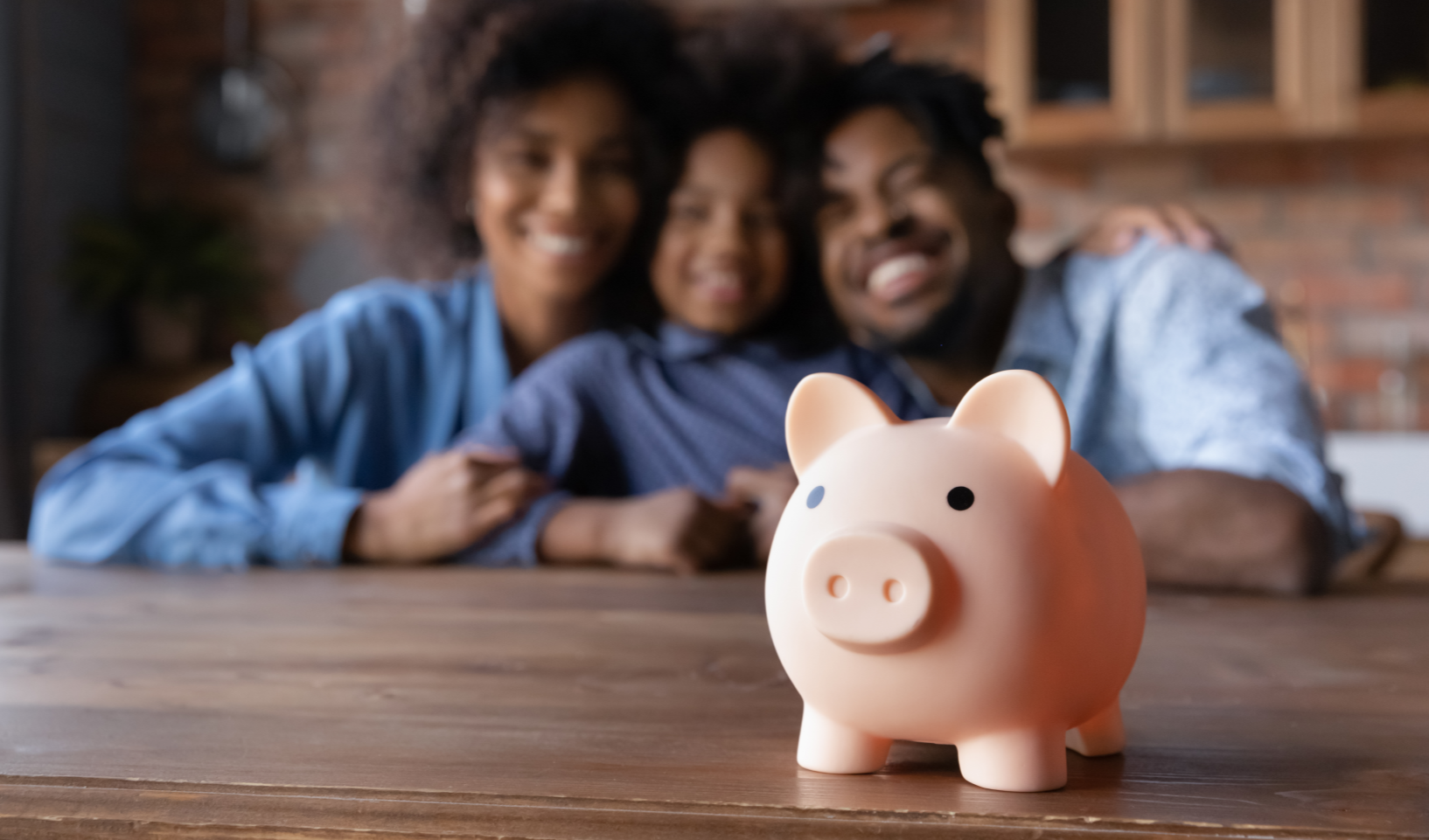 british-family-with-a-piggy-bank-saving-money